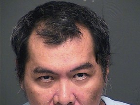In this undated photo provided by the Arizona Department of Corrections shows Huy Chi Tran.  Tran died June 12, 2018 at Banner Medical Center in Casa Grande, Ariz., where he was sent June 5 from nearby Eloy Detention Center. The 47-year-old was awaiting deportation after a prison sentence for aggravated assault.  Tran's death remains under investigation. (Arizona Department of Corrections/via AP)
