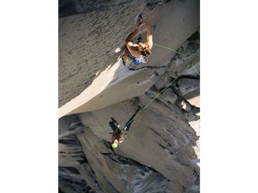 In this June 3, 2018 photo provided by Corey Rich, Alex Honnold, top and Tommy Caldwell climb The Nose of El Capitan in Yosemite National Park, Calif. Days after two of the world's most celebrated rock climbers twice set astonishingly fast records on the biggest wall in Yosemite National Park, they did it again Wednesday, June 6, 2018, breaking a mark compared with track's four-minute mile.