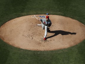 Philadelphia Phillies starting pitcher Aaron Nola throws to a Los Angeles Dodgers during the first inning of a baseball game, Thursday, May 31, 2018, in Los Angeles.