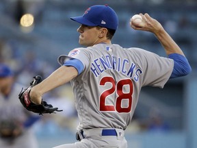 Chicago Cubs starting pitcher Kyle Hendricks throws to a Los Angeles Dodgers batter during the first inning of a baseball game in Los Angeles, Wednesday, June 27, 2018.