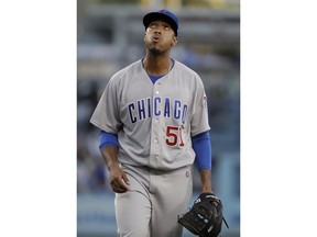 Chicago Cubs starting pitcher Duane Underwood Jr. reacts after the first inning of a baseball game against the Los Angeles Dodgers in Los Angeles, Monday, June 25, 2018.