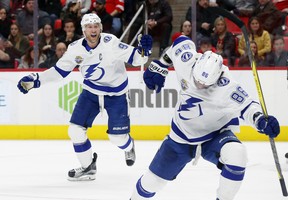 In this Jan. 7 file photo, Tampa Bay Lightning right wing Nikita Kucherov, right, celebrates his goal against the Detroit Red Wings with captain Steven Stamkos.