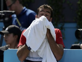 Croatia's Marin Cilic during a break in his final tennis match against Serbia's Novak Djokovic at the Queen's Club tennis tournament in London, Sunday, June 24, 2018.