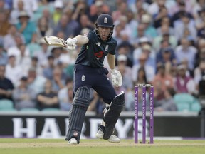 England captain Eoin Morgan shouts to his batting partner Joe Root not to run during the one-day cricket match between England and Australia at the Oval cricket ground in London, Wednesday, June 13, 2018. The game is the first of a five match one-day series between the two sides.