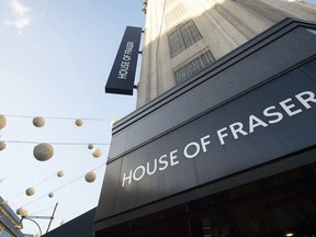 FILE - This Jan. 7, 2018 file photo shows the Oxford Street, London branch of House of Fraser. The move toward online shopping and a Brexit-related rise in prices are causing more pain for British retailers, with department store House of Fraser filing plans in court Wednesday June 6, 2018, saying it plans to close over half its stores, including its flagship premises on London's Oxford Street.