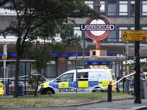Emergency services at the scene of a small explosion at Southgate Underground station, in London, Tuesday June 19, 2018. London police are investigating a small explosion at the Southgate Underground station that officials say does not seem to be related to terrorism.