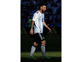 Argentina's Lionel Messi walks on he pitch during the round of 16 match between France and Argentina, at the 2018 soccer World Cup at the Kazan Arena in Kazan, Russia, Saturday, June 30, 2018.
