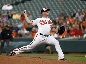 Baltimore Orioles starting pitcher Dylan Bundy throws to the Boston Red Sox in the first inning of a baseball game, Monday, June 11, 2018, in Baltimore.