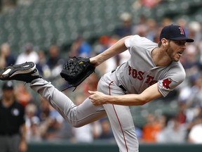 Boston Red Sox starting pitcher Chris Sale follows through on a pitch to the Baltimore Orioles in the second inning of a baseball game, Wednesday, June 13, 2018, in Baltimore.