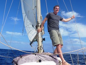In this undated handout photo Michael Hurley poses aboard a sailboat. Hurley was rescued from his storm-battered sailboat by the Maine Maritime Academy training ship in 2015. Hurley, a novelist, has completed a 7,000-mile trouble-free sail that'll be capped off with a wedding in London.
