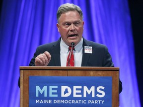 FILE - In this May 18, 2018 file photo, Craig Olson, a candidate for the 2nd District Congressional seat, addresses the Democratic Convention in Lewiston, Maine. Mainers go to the ballot box, Tuesday, June 12, 2018, to rank candidates for the first time. It's the biggest test yet of ranked-choice voting.