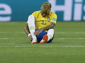 Brazil's Neymar reacts during the group E match between Brazil and Switzerland at the 2018 soccer World Cup in the Rostov Arena in Rostov-on-Don, Russia, Sunday, June 17, 2018.