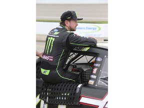 Kurt Busch watches the track to see if his qualifying will win the pole for Sunday's NASCAR Cup Series auto race in Brooklyn, Mich., Friday, June 8, 2018. Busch won the pole.