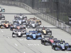 Alexander Rossi leads the field at the start of the second race of the IndyCar Detroit Grand Prix auto racing doubleheader, Sunday, June 3, 2018, in Detroit.