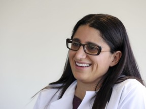 In this Thursday, May 17, 2018 photo, Dr. Mona Hanna-Attisha is interviewed in Flint, Mich. A new book about Flint's water crisis comes from the pediatrician and public health expert who was first to reveal the extent of lead contamination on the struggling city's children. Dr. Hanna-Attisha's book, "What The Eyes Don't See: A Story of Crisis, Resistance, and Hope in an American City," goes on sale Tuesday.