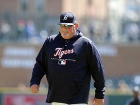 FILE- In an April 20, 2018 file photo Detroit Tigers pitching coach Chris Bosio walks to the dugout during the seventh inning of game one of a baseball doubleheader against the Kansas City Royals in Detroit. The Tigers have fired Bosio saying his contract was terminated for insensitive comments that were in violation of team policy and his contract. The team says it holds employees to the highest standards of personal conduct on and off the field, adding it has zero tolerance for Bosio's behavior.