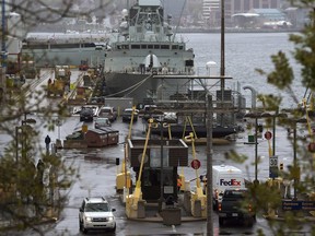 Vehicles enter Canadian Forces Base Halifax, in Halifax, on October 22, 2014.