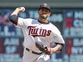 Minnesota Twins starting pitcher Fernando Romero throws to the Chicago White Sox in the first inning in game 1 of a doubleheader baseball game Tuesday, June 5, 2018, in Minneapolis. As a makeup game from Jackie Robinson Day, all players and coaches wear 42.