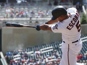 Minnesota Twins' Eduardo Escobar hits a two-run home run off Chicago White Sox pitcher James Shields in the first inning of a baseball game Thursday, June 7, 2018, in Minneapolis.