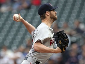 Boston Red Sox pitcher Chris Sale throws to a Minnesota Twins batter during the first inning of a baseball game Tuesday, June 19, 2018, in Minneapolis.