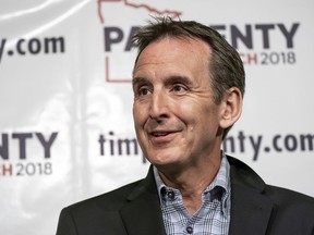 FILE - In this Thursday, May 31, 2018, file photo, former Minnesota Gov. Tim Pawlenty speaks at a news conference in St. Paul, Minn. U.S. President Donald Trump is heading to Minnesota to stump for a congressional candidate, but another test of GOP loyalty to the president looms large over his visit. Minnesota's Republican primary for governor provides the latest test case. It features a strong Trump supporter going up against Pawlenty, who called Trump "unhinged" at one point during the 2016 campaign. Pawlenty says now that he voted for Trump and supports his policies.