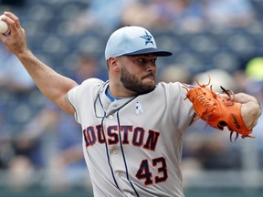 Houston Astros pitcher Lance McCullers Jr. throws to a Kansas City Royals batter in the first inning of a baseball game at Kauffman Stadium in Kansas City, Mo., Sunday, June 17, 2018.