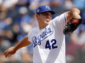 Kansas City Royals starting pitcher Brad Keller throws during the first inning of a baseball game against the Los Angeles Angels Monday, June 25, 2018, in Kansas City, Mo.