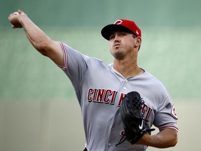 Cincinnati Reds starting pitcher Tyler Mahle throws during the first inning of the team's baseball game against the Kansas City Royals on Wednesday, June 13, 2018, in Kansas City, Mo.