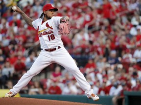 St. Louis Cardinals starting pitcher Carlos Martinez throws during the first inning of the team's baseball game against the Miami Marlins on Tuesday, June 5, 2018, in St. Louis.