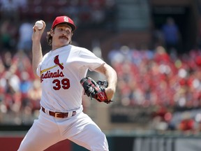 St. Louis Cardinals starting pitcher Miles Mikolas throws during the first inning of a baseball game against the Miami Marlins Thursday, June 7, 2018, in St. Louis.