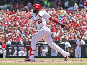 St. Louis Cardinals' Marcell Ozuna watches his grand slam during the first inning of a baseball game against the Pittsburgh Pirates, Sunday, June 3, 2018, in St. Louis.