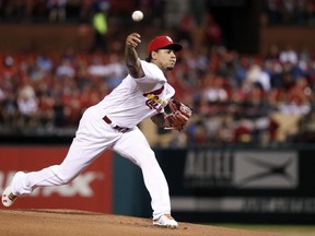 St. Louis Cardinals starting pitcher Carlos Martinez throws during the first inning of the team's baseball game against the Cleveland Indians on Tuesday, June 26, 2018, in St. Louis.