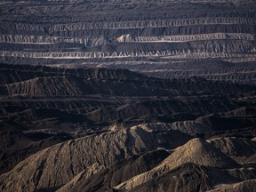 In this Tuesday, June 5, 2018 photo, mining debris covers the ground of a lignite coal pit near the village of Welzow in the Lusatia (Lausitz) area in Germany.