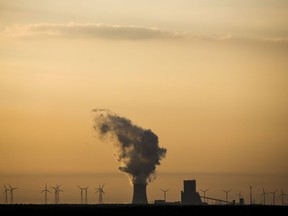 In this Tuesday, June 5, 2018 photo, steam rises in the air from the brown coal power plant Schwarze Pumpe in the Lusatia, (Lausitz) area in Germany.