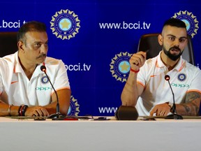 Indian cricket captain Virat Kohli, right and head coach Ravi Shastri address the media ahead of the team's travel to England and Ireland in New Delhi, India, Friday, June 22, 2018.