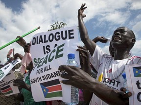 South Sudanese people cheer as they await the arrival back in the country of South Sudan's President Salva Kiir, at the airport in Juba, South Sudan Friday, June 22, 2018. The latest attempt at ending South Sudan's five-year civil war failed Friday as President Salva Kiir rejected working again with rival Riek Machar after their first face-to-face meeting in almost two years.