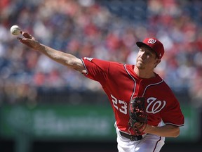 Washington Nationals starting pitcher Erick Fedde delivers during the first inning of a baseball game against the Philadelphia Phillies, Saturday, June 23, 2018, in Washington.