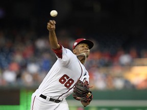Washington Nationals starting pitcher Jefry Rodriguez delivers during the first inning of a baseball game against the Philadelphia Phillies, Sunday, June 24, 2018, in Washington.