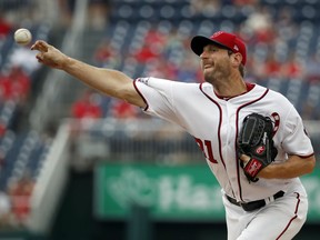 Washington Nationals starting pitcher Max Scherzer throws during the first inning of a baseball game against the San Francisco Giants at Nationals Park, Sunday, June 10, 2018, in Washington.
