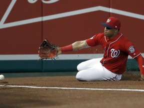 Washington Nationals right fielder Juan Soto cannot catch a ball hit for an RBI-double by San Francisco Giants' Brandon Crawford during the fifth inning of a baseball game at Nationals Park, Friday, June 8, 2018, in Washington.