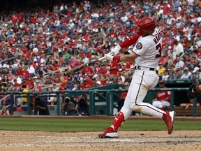 Washington Nationals' Bryce Harper hits a solo home run during the fourth inning of a baseball game against the San Francisco Giants at Nationals Park, Saturday, June 9, 2018, in Washington.