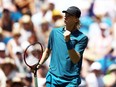 Denis Shapovalov pumps his first during his match against Jared Donaldson at the Nature Valley International at Devonshire Park in Eastbourne, United Kingdom, on June 27.