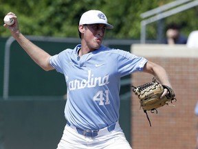 North Carolina pitcher Cooper Criswell (41) throws against Stetson during the first inning of an NCAA super regional college baseball game in Chapel Hill, N.C., Friday, June 8, 2018.