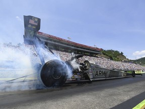 In this photo provided by the NHRA, Tony Schumacher locks down his first Top Fuel victory of the season Sunday, June 17, 2018, as he emerged victorious at the annual Fitzgerald USA NHRA Thunder Valley Nationals in Bristol, Tenn.