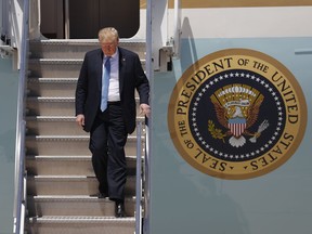 President Donald Trump arrives Saturday, June 23, 2018, in Las Vegas. Trump came to Las Vegas to headline a fundraiser for Sen. Dean Heller. He's also delivering the keynote address at the Nevada GOP convention and holding a separate event to promote tax cuts he signed into law six months ago.