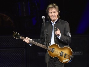 FILE - In this July 26, 2017 file photo, Paul McCartney performs on the One on One Tour at the Hollywood Casino Amphitheatre in Tinley Park, Ill.  The former Beatle announced on social media on Wednesday, June 20, 2018,  that "Egypt Station" will be released on Sept. 7. The title comes from the name of one of McCartney's paintings and it will be McCartney's first full album since "NEW" in 2013.