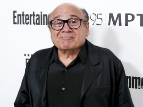 FILE - In this April 7, 2016 file photo, Danny DeVito arrives at the 5th Annual Reel Stories, Real Lives Benefit in Los Angeles.  Disney has released its first teaser trailer for Tim Burton's remake of the classic "Dumbo." The live-action film stars Danny DeVito, Colin Farrell, Alan Arkin, Eva Green and Michal Keaton. Originally released in 1941, "Dumbo" is the story about an elephant with big ears who can fly.