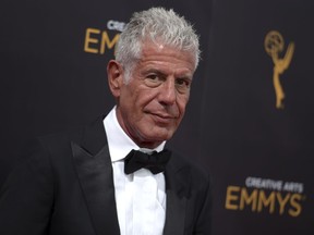 FILE - In this Sept. 11, 2016 file photo, Anthony Bourdain arrives at night two of the Creative Arts Emmy Awards at the Microsoft Theater in Los Angeles.   Bourdain has been found dead in his hotel room in France, Friday, June 8, 2018,  while working on his CNN series on culinary traditions around the world.