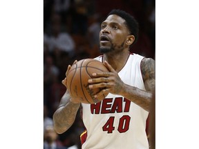 FILE - In this April 12, 2017, file photo, Miami Heat forward Udonis Haslem prepares to take a shot during the final seconds of an NBA basketball game against the Washington Wizards, in Miami. Haslem's name was never called on draft night in 2003. Most of the players picked that year are long gone: only eight of the 58 selections played in the NBA this past season. Haslem is still around, though, and his story serves as a reminder: Getting taken in the draft doesn't guarantee much.
