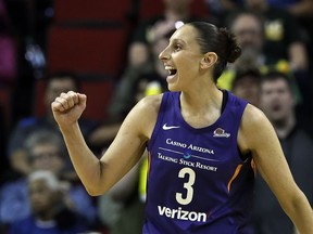 FILE - In this May 20, 2018, file photo, Phoenix Mercury's Diana Taurasi reacts to a call in their favor against the Seattle Storm in the first half of a WNBA basketball game, in Seattle. Taurasi is looking refreshed this season. She used her time away from playing basketball this winter to rest, recover and "tune-up her body.
